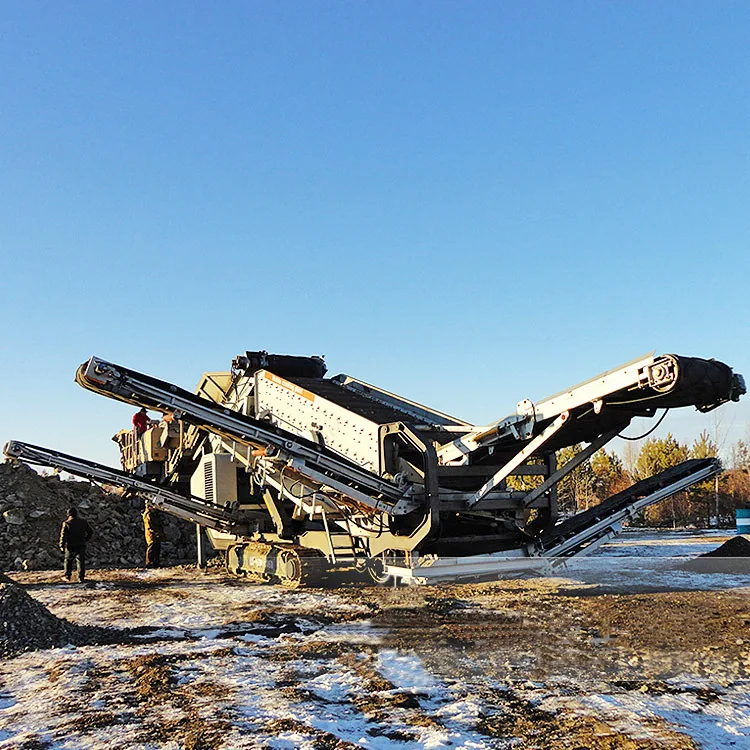 Trailer mobile crushing plant recycling demolition concrete on an urban site