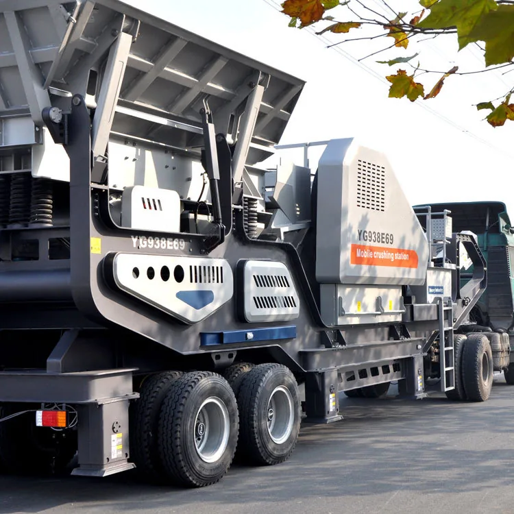 Trailer mobile crushing plant in transport position with conveyors folded